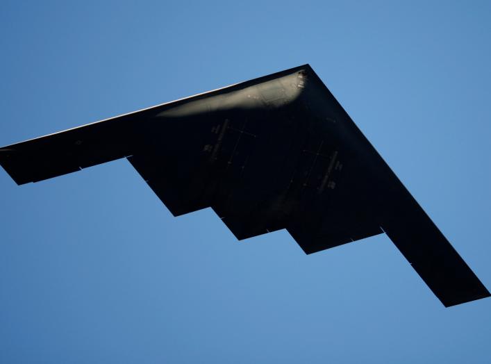 A B-2 Stealth Bomber performs a flyover at the 126th Rose Parade in Pasadena, California January 1, 2015. REUTERS/David McNew (UNITED STATES - Tags: TRANSPORT MILITARY ANNIVERSARY)