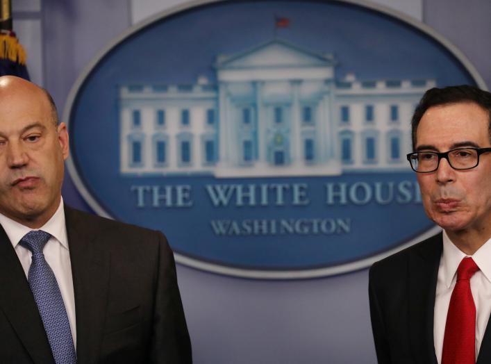 U.S. National Economic Director Gary Cohn (L) and Treasury Secretary Steven Mnuchin react to questions while unveiling the Trump administration's tax reform proposal in the White House briefing room in Washington, U.S, April 26, 2017. REUTERS/Carlos Barri