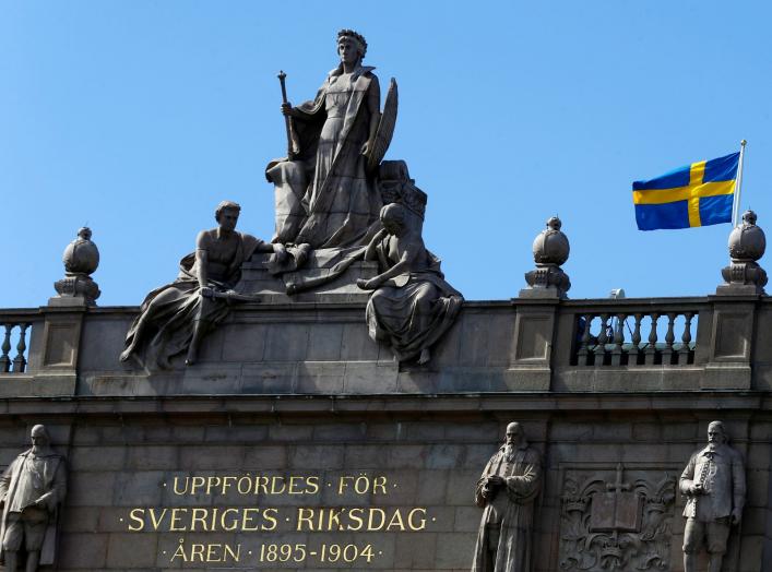 The Swedish flag flutters next to the Riksdag, the Swedish Parliament, in Stockholm, Sweden, May 7, 2017. REUTERS/Ints Kalnins