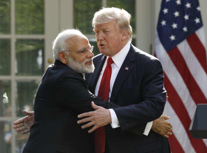 India's Prime Minister Narendra Modi hugs U.S. President Donald Trump as they give joint statements in the Rose Garden of the White House in Washington, U.S., June 26, 2017. REUTERS/Kevin Lamarque