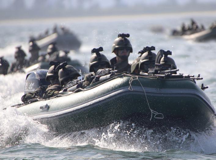 Special operation forces of the Korean People's Army (KPA), guided by North Korean leader Kim Jong Un, take part in a target-striking contest to occupy islands in this undated picture provided by KCNA in Pyongyang on August 25, 2017. KCNA via Reuters