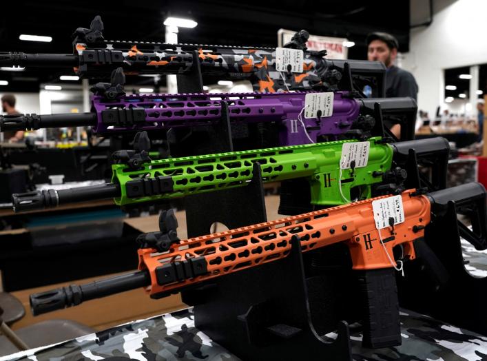 AR-15 rifles with colored hand guards are displayed for sale at the Guntoberfest gun show in Oaks, Pennsylvania, U.S., October 6, 2017. REUTERS/Joshua Roberts