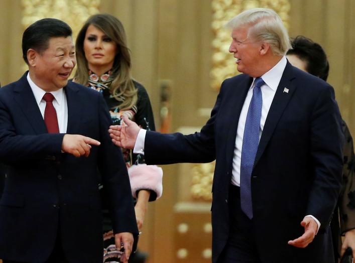 U.S. President Donald Trump and China's President Xi Jinping arrive at a state dinner at the Great Hall of the People in Beijing, China, November 9, 2017. REUTERS/Thomas Peter