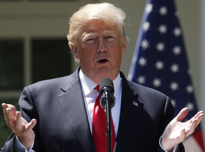 U.S. President Donald Trump addresses a joint news conference with Nigeria's President Muhammadu Buhari in the Rose Garden of the White House in Washington, U.S., April 30, 2018.