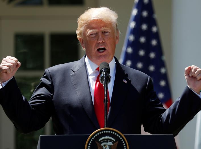 U.S. President Donald Trump gestures while addressing a joint news conference with Nigeria's President Muhammadu Buhari in the Rose Garden of the White House in Washington, U.S., April 30, 2018.