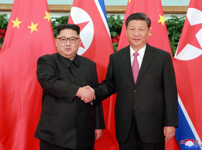 North Korean leader Kim Jong Un shakes hands with China's President Xi Jinping, in Dalian, China in this undated photo released on May 9, 2018 by North Korea's Korean Central News Agency (KCNA). KCNA/via REUTERS ATTENTION EDITORS - THIS PICTURE WAS PROVID
