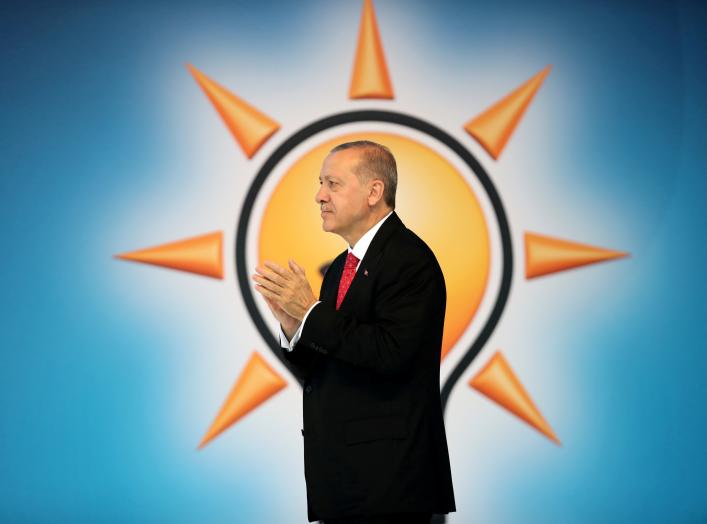 Turkish President Tayyip Erdogan announces his ruling AK Party's manifesto for next month's election.