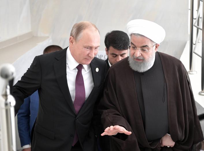 Russian President Vladimir Putin and Iranian President Hassan Rouhani attend a meeting during the Fifth Caspian Summit in Aktau, Kazakhstan August 12, 2018. Sputnik/Alexei Nikolsky/Kremlin via REUTERS 