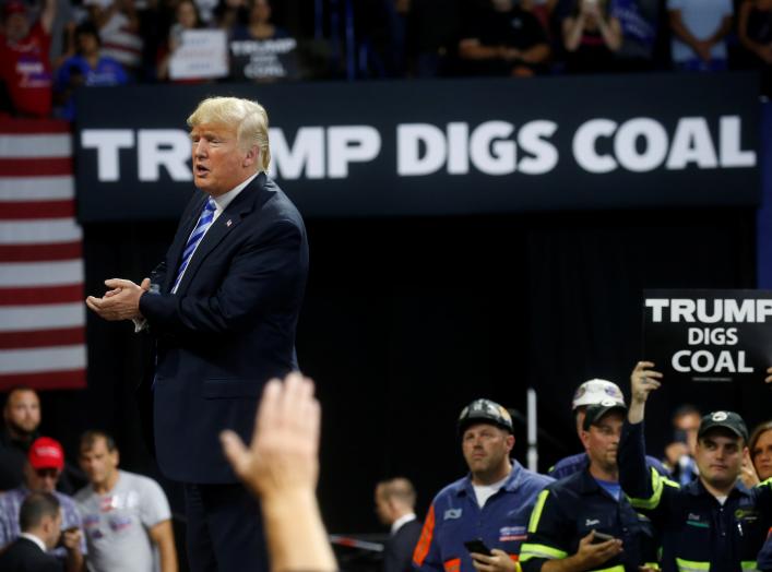 U.S. President Donald Trump acknowledges coal miners during a Make America Great Again rally at the Civic Center in Charleston, West Virginia, U.S., August 21, 2018. REUTERS/Leah Millis