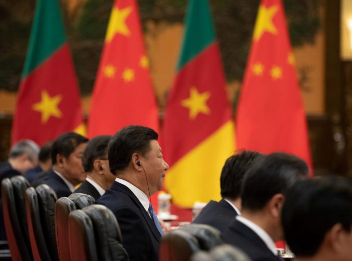 China's President Xi Jinping (C) during his bilateral meeting with President of Cameroon Paul Biya (not pictured) at the Great Hall of the People in Beijing, China, August 31, 2018. Roman Pilipey/Pool via REUTERS