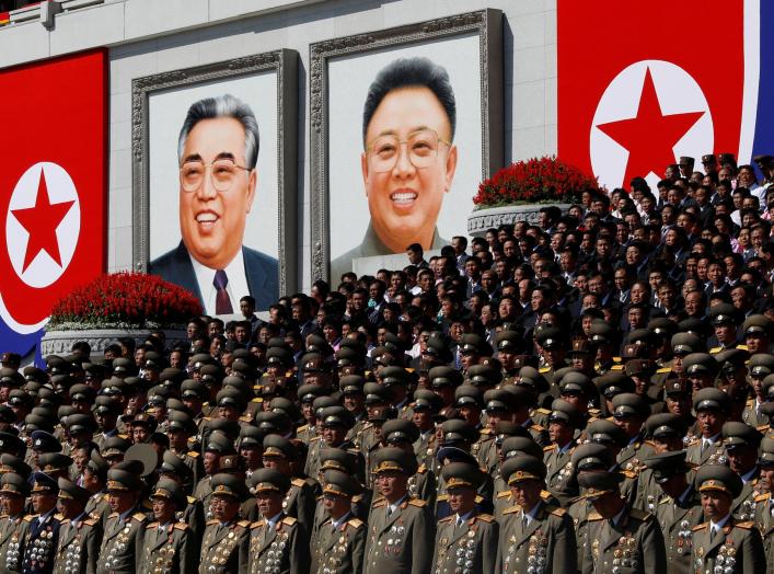 Senior military officials watch a parade as portraits of late North Korean leaders Kim Il Sung and Kim Jong Il are seen in the background at the main Kim Il Sung square in Pyongyang, North Korea, September 9, 2018. REUTERS/Danish Siddiqui SEARCH "DYNASTY 