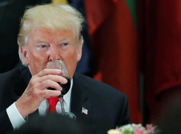 U.S. President Donald Trump sips Diet Coke from his wine glass after a toast during a luncheon for world leaders at the 73rd session of the United Nations General Assembly in New York, U.S., September 25, 2018. REUTERS/Carlos Barria