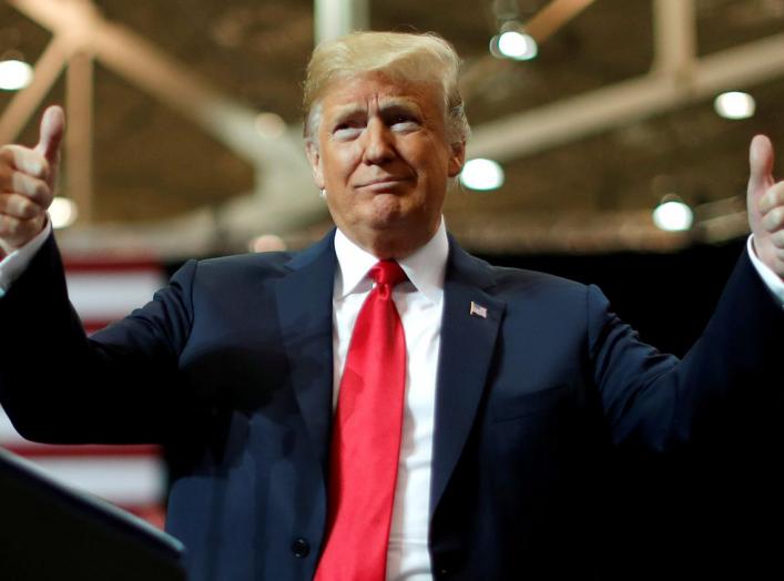 FILE PHOTO: U.S. President Donald Trump gives two thumbs up to the crowd during a campaign rally on the eve of the U.S. mid-term elections in Cleveland, Ohio., U.S., November 5, 2018. REUTERS/Carlos Barria - RC112DDE3390/File Photo