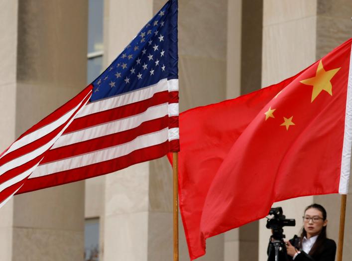 U.S. and Chinese flags are seen before Defense Secretary James Mattis welcomes Chinese Minister of National Defense Gen. Wei Fenghe to the Pentagon in Arlington, Virginia, U.S., November 9, 2018. REUTERS/Yuri Gripas