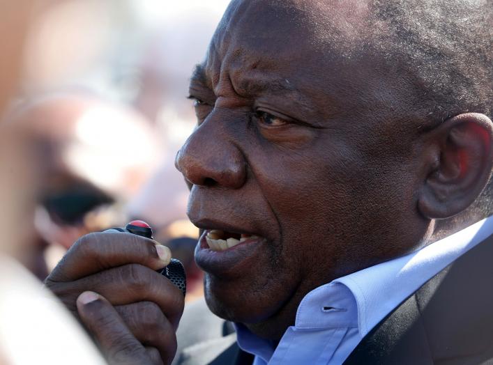 FILE PHOTO: South African President Cyril Ramaphosa speaks during a visit to crime ridden Hanover Park township to launch a new Anti-Gang Unit, in Cape Town, South Africa November 2, 2018. REUTERS/Mike Hutchings/File Photo