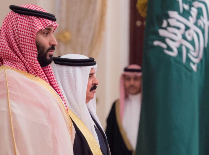 Saudi Arabia's Crown Prince Mohammed bin Salman Al Saud is received by Bahraini King Hamad bin Isa Al Khalifa in Manama, Bahrain, November 26, 2018. Bandar Algaloud/Courtesy of Saudi Royal Court/Handout via REUTERS ATTENTION EDITORS - THIS PICTURE WAS PRO
