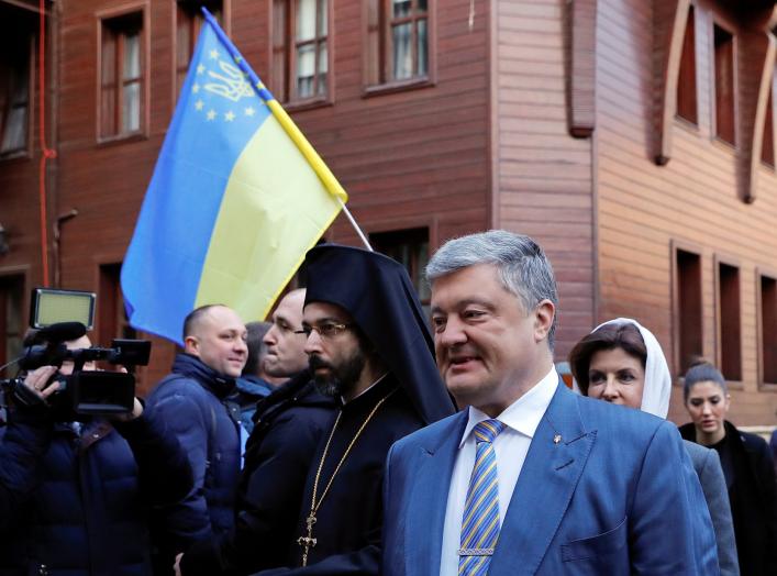 Ukrainian President Petro Poroshenko and his wife Maryna arrive for the Epiphany mass at the Patriarchal Cathedral of St. George in Istanbul, Turkey January 6, 2019. REUTERS/Murad Sezer