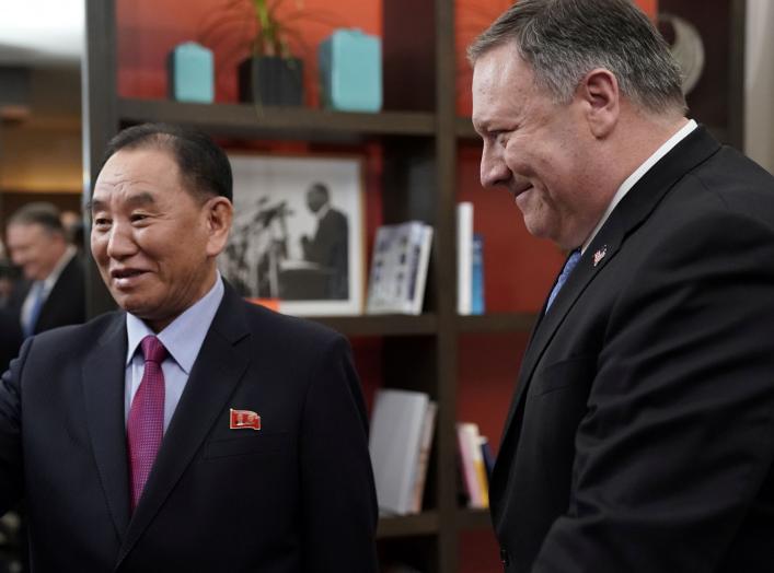 U.S. Secretary of State Mike Pompeo escorts Vice Chairman of the North Korean Workers' Party Committee Kim Yong Chol, North Korea's lead negotiator in nuclear diplomacy with the United States, into talks aimed at clearing the way for a second U.S.-North K