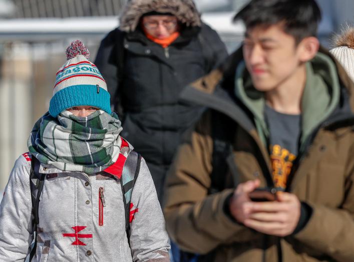 A student dressed for sub-zero temperatures walks to class at the University of Minnesota in Minneapolis, Minnesota, U.S., January 29, 2019. REUTERS/Eric Miller