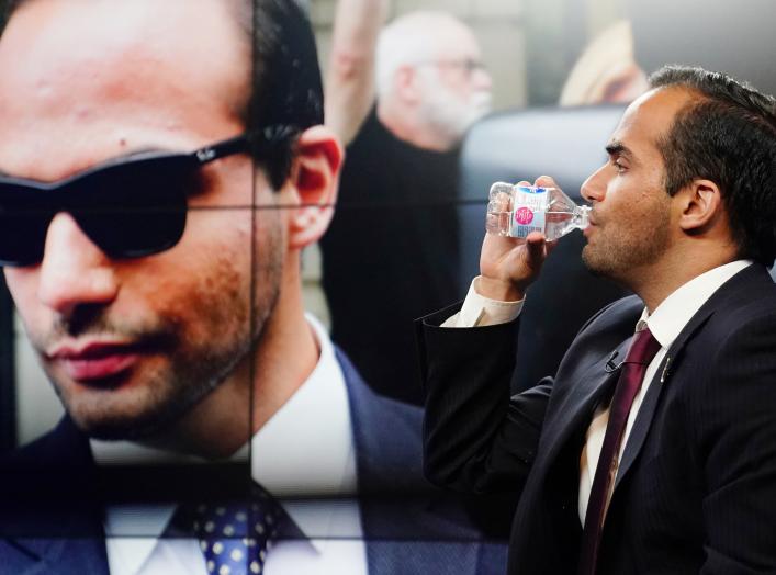 George Papadopoulos, a former member of the foreign policy panel to Donald Trump's 2016 presidential campaign, conducts a TV interview in New York, New York, U.S., March 26, 2019. REUTERS/Carlo Allegri