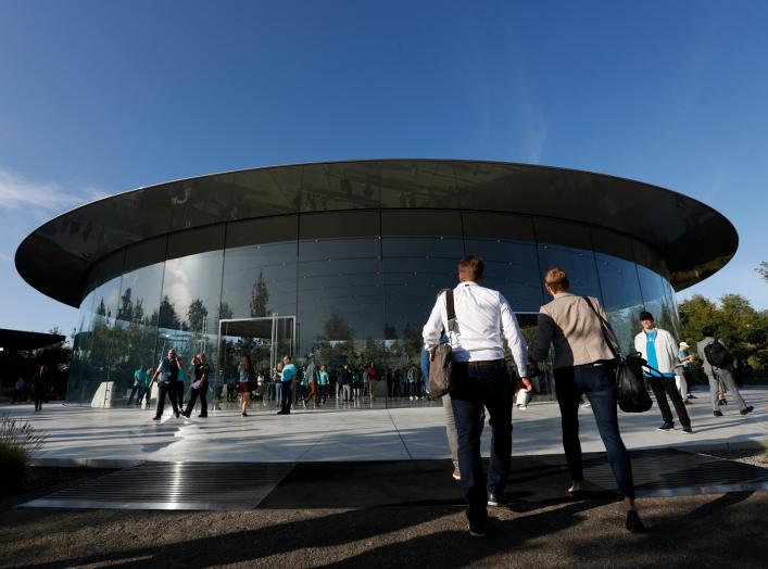 Guests arrive for at the Steve Jobs Theater for an Apple event at their headquarters in Cupertino, California, U.S. September 10, 2019. REUTERS/Stephen Lam