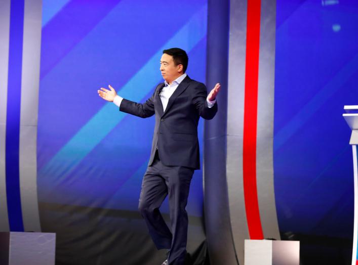 Entrepreneur Andrew Yang takes the stage for the start of the 2020 Democratic U.S. presidential debate in Houston, Texas, U.S., September 12, 2019. REUTERS/Jonathan Bachman
