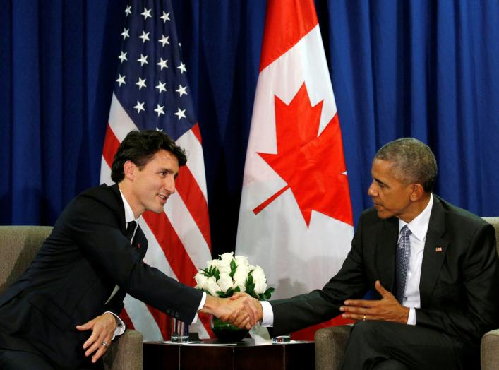 FILE PHOTO: U.S. President Barack Obama meets Canadian Prime Minister Justin Trudeau at the APEC Summit in Lima, Peru November 20, 2016. REUTERS/Kevin Lamarque/File Photo