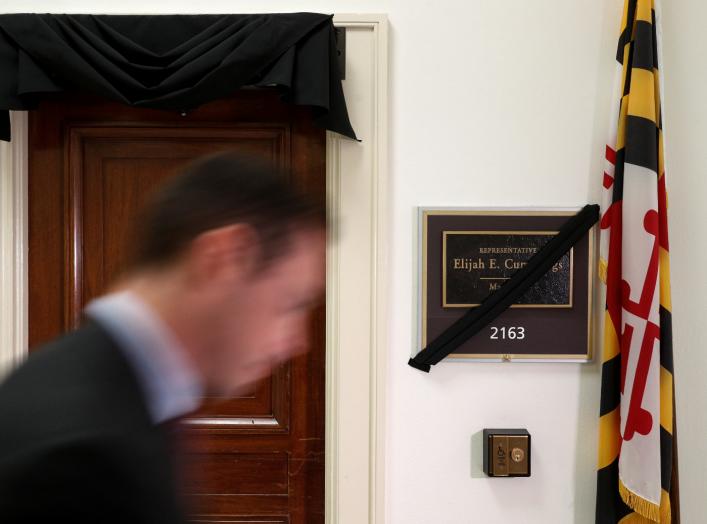 A man passes pass by the office of deceased Congressman Elijah Cummings (D-MD), on Capitol Hill, in Washington, U.S., October 17, 2019. REUTERS/Tom Brenner