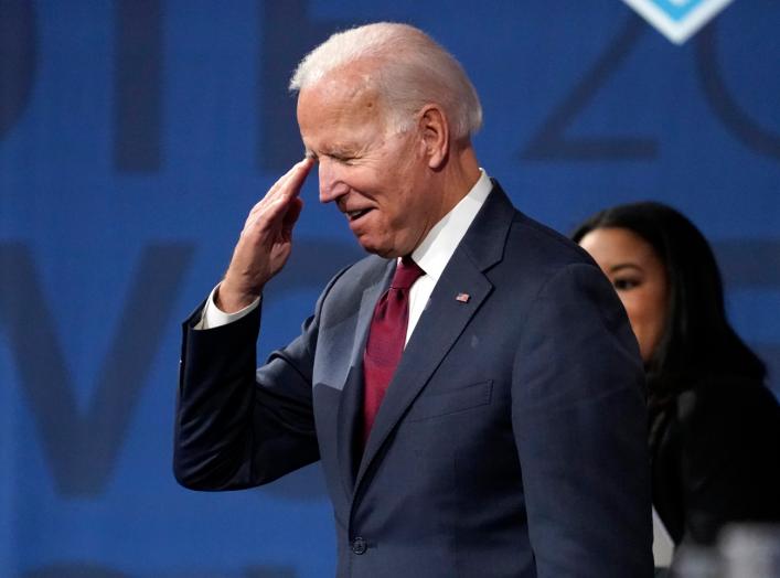 Former Vice President Joe Biden salutes supporters after the sixth 2020 U.S. Democratic presidential candidates campaign debate at Loyola Marymount University in Los Angeles, California, U.S., December 19, 2019. REUTERS/Mike Blake