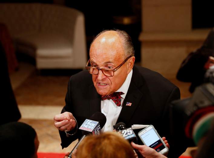 U.S. President Donald Trump's personal lawyer Rudy Giuliani is interviewed by the press at the Mar-a-Lago resort in Palm Beach, Florida, U.S. December 31, 2019. REUTERS/Tom Brenner