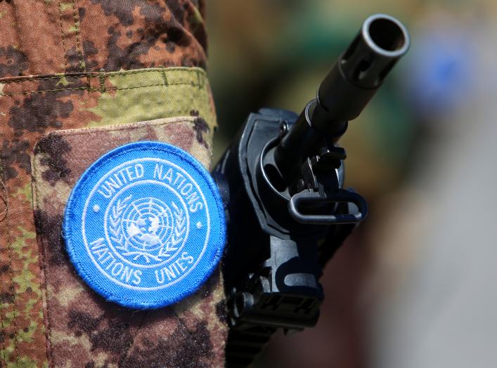 The weapon of a peacekeeper of the United Nations Interim Force in Lebanon (UNIFIL) is pictured during a handover ceremony from Italian Major-General Luciano Portolano to Irish Major-General Michael Bearyover the command of Lebanon's U.N. peacekeeping for