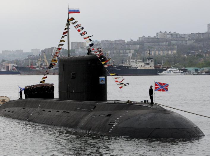 The crew of the Varshavyanka class diesel submarine take part at the Victory Day parade in Vladivostok, Russia, May 9, 2015. Russia marks the 70th anniversary of the end of World War Two in Europe on Saturday with a military parade, showcasing new militar