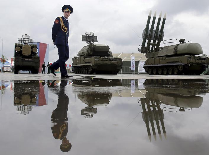 A Russian serviceman walks past the Buk-1M missile system at the Army-2015 international military forum in Kubinka, outside Moscow, Russia, June 16, 2015. REUTERS/Maxim Shemetov