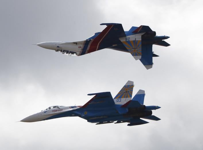 Sukhoi Su-27 jet fighters of the Russkiye Vityazi (Russian Knights) aerobatic team perform during the MAKS International Aviation and Space Salon in Zhukovsky outside Moscow, Russia, August 30, 2015. REUTERS/Maxim Zmeyev
