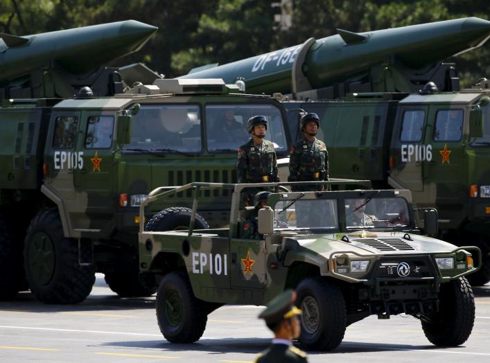 Military vehicles carry DF-15B short-range ballistic missiles during the military parade to mark the 70th Anniversary of the end of World War Two, in Beijing, China, September 3, 2015. REUTERS/Damir Sagolj