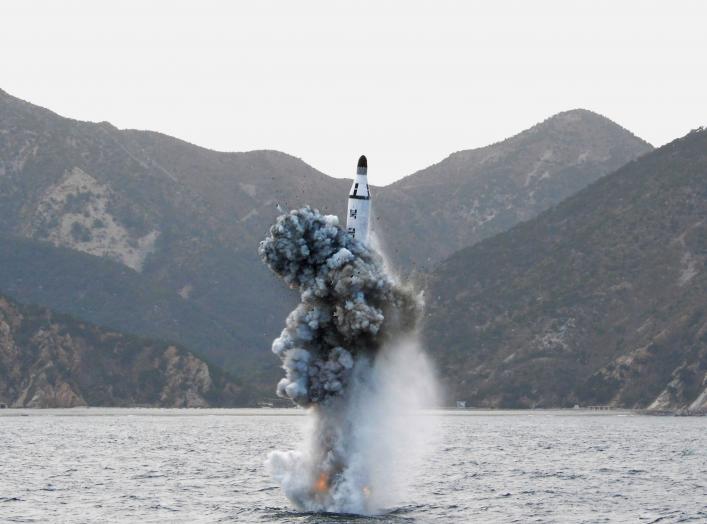 North Korean leader Kim Jong Un guides on the spot the underwater test-fire of strategic submarine ballistic missile in this undated photo released by North Korea's Korean Central News Agency (KCNA) in Pyongyang on April 24, 2016. KCNA/via REUTERS. ATTENT