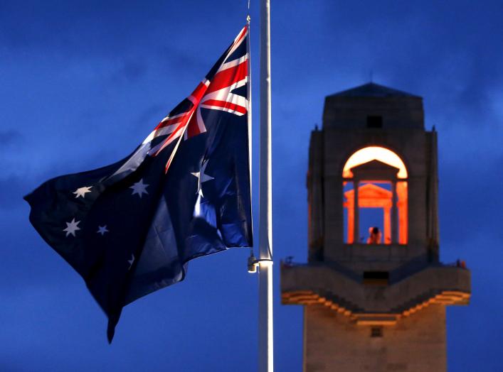 An Australian flag is flown at half mast during the dawn service to mark the ANZAC (Australian and New Zealand Army Corps) commemoration ceremony at the Australian National Memorial in Villers-Bretonneux, France, April 25, 2016. REUTERS/Pascal Rossignol