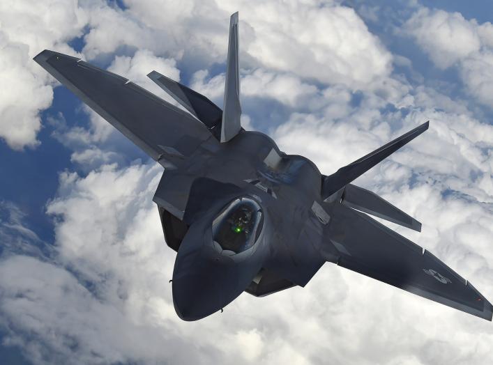 A U.S. F-22 Raptor fighter flies over European airspace during a flight to Britain from Mihail Kogalniceanu air base in Romania April 25, 2016. REUTERS/Toby Melville