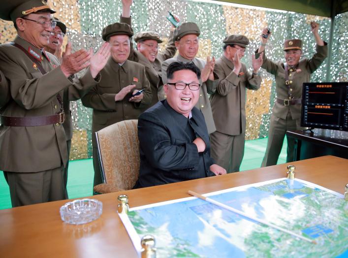 North Korean leader Kim Jong Un reacts during a test launch of ground-to-ground medium long-range ballistic rocket Hwasong-10 in this undated photo released by North Korea's Korean Central News Agency (KCNA) on June 23, 2016. REUTERS/KCNA 