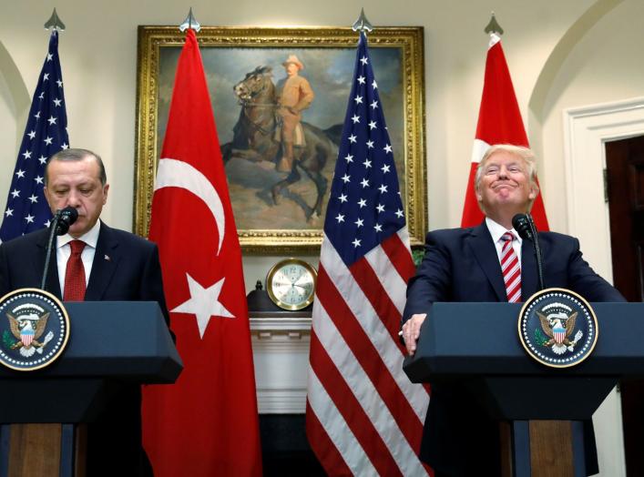 Turkey's President Recep Tayyip Erdogan (L) and U.S President Donald Trump deliver statements to reporters in the Roosevelt Room of the White House in Washington, U.S. May 16, 2017. REUTERS/Kevin Lamarque TPX IMAGES OF THE DAY