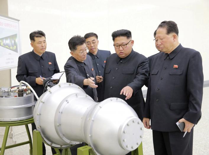  North Korean leader Kim Jong Un provides guidance with Ri Hong Sop (2nd L) and Hong Sung Mu (R) on a nuclear weapons program in this undated photo released by North Korea's Korean Central News Agency (KCNA) in Pyongyang September 3, 2017. KCNA via REUTER