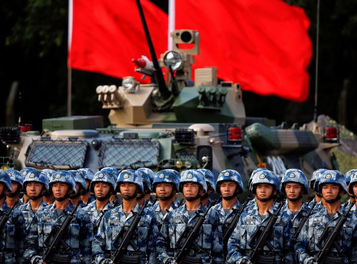 Troops prepare for the arrival of Chinese President Xi Jinping (unseen) at the People's Liberation Army (PLA) Hong Kong Garrison in one of events marking the 20th anniversary of the city's handover from British to Chinese rule, in Hong Kong, China June 30