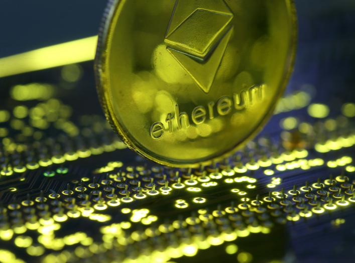 Representation of the Ethereum virtual currency standing on the PC motherboard is seen in this illustration picture, February 3, 2018. REUTERS/Dado Ruvic/Illustration