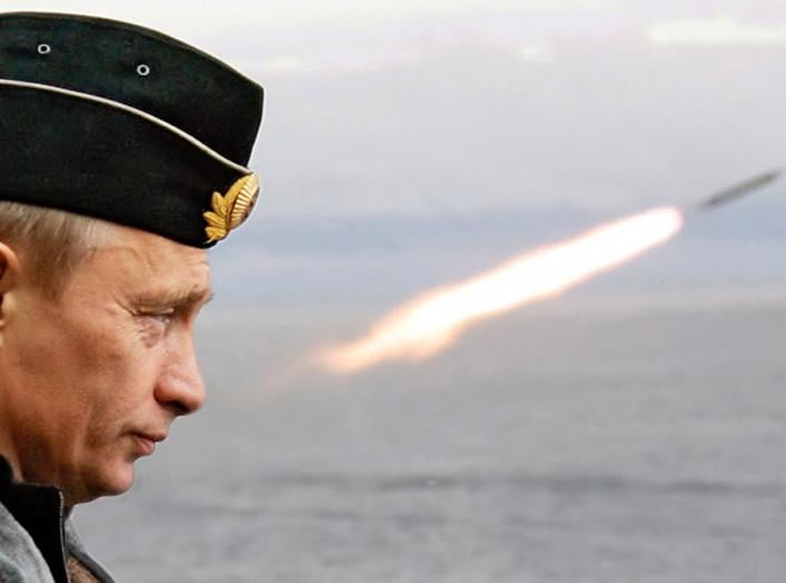 Russian President Putin watches the launch of a missile during naval exercises in Russia's Arctic North on board the nuclear missile cruiser Pyotr Veliky. Russian President Vladimir Putin watches the launch of a missile during naval exercises in Russia's 