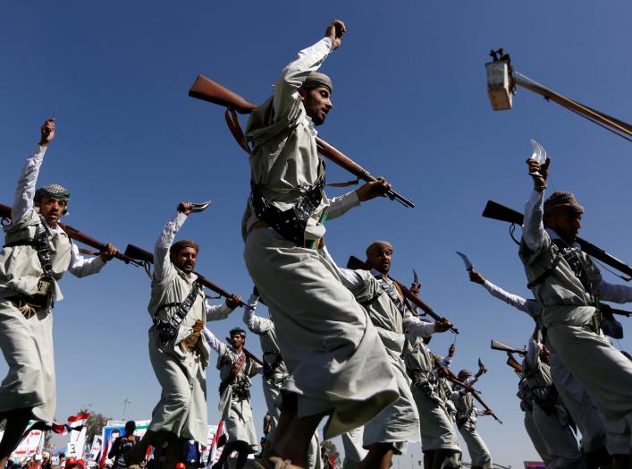 Houthi performers dance during a rally to mark the third anniversary of the Saudi-led intervention in the Yemeni conflict in Sanaa, Yemen March 26, 2018. REUTERS/Khaled Abdullah