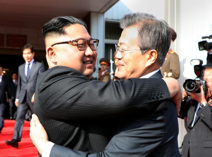 South Korean President Moon Jae-in bids fairwell to North Korean leader Kim Jong Un as he leaves after their summit at the truce village of Panmunjom, North Korea, in this handout picture provided by the Presidential Blue House on May 26, 2018. The Presid