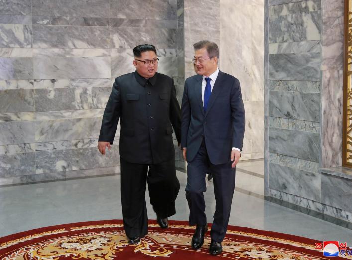 South Korean President Moon Jae-in meets with North Korean leader Kim Jong Un during their summit at the truce village of Panmunjom, North Korea, in this handout picture released by North Korea's Korean Central News Agency (KCNA) on May 27, 2018. KCNA/via