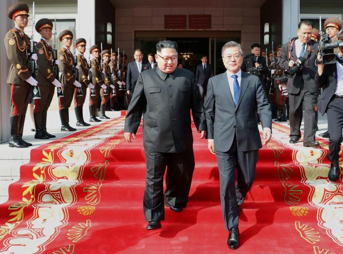 South Korean President Moon Jae-in and North Korean leader Kim Jong Un leave after their summit at the truce village of Panmunjom, North Korea, in this handout picture provided by the Presidential Blue House on May 26, 2018. Picture taken on May 26, 2018.