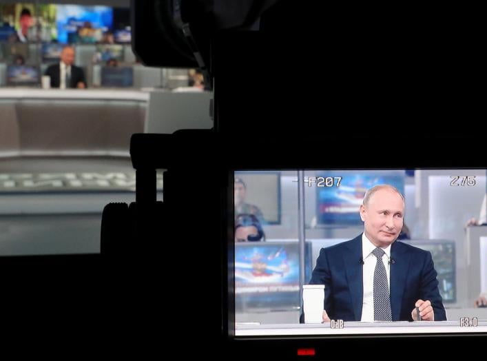Russian President Vladimir Putin is seen on a video camera screen as he attends a live nationwide broadcast call-in in Moscow, Russia June 7, 2018. Sputnik/Mikhail Klimentyev/Kremlin via REUTERS