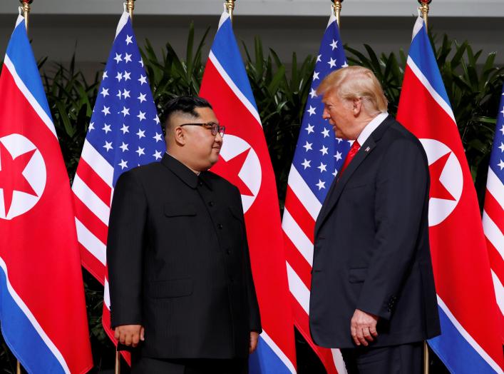 U.S. President Donald Trump and North Korea's leader Kim Jong Un meet at the Capella Hotel on the resort island of Sentosa, Singapore June 12, 2018. REUTERS/Jonathan Ernst